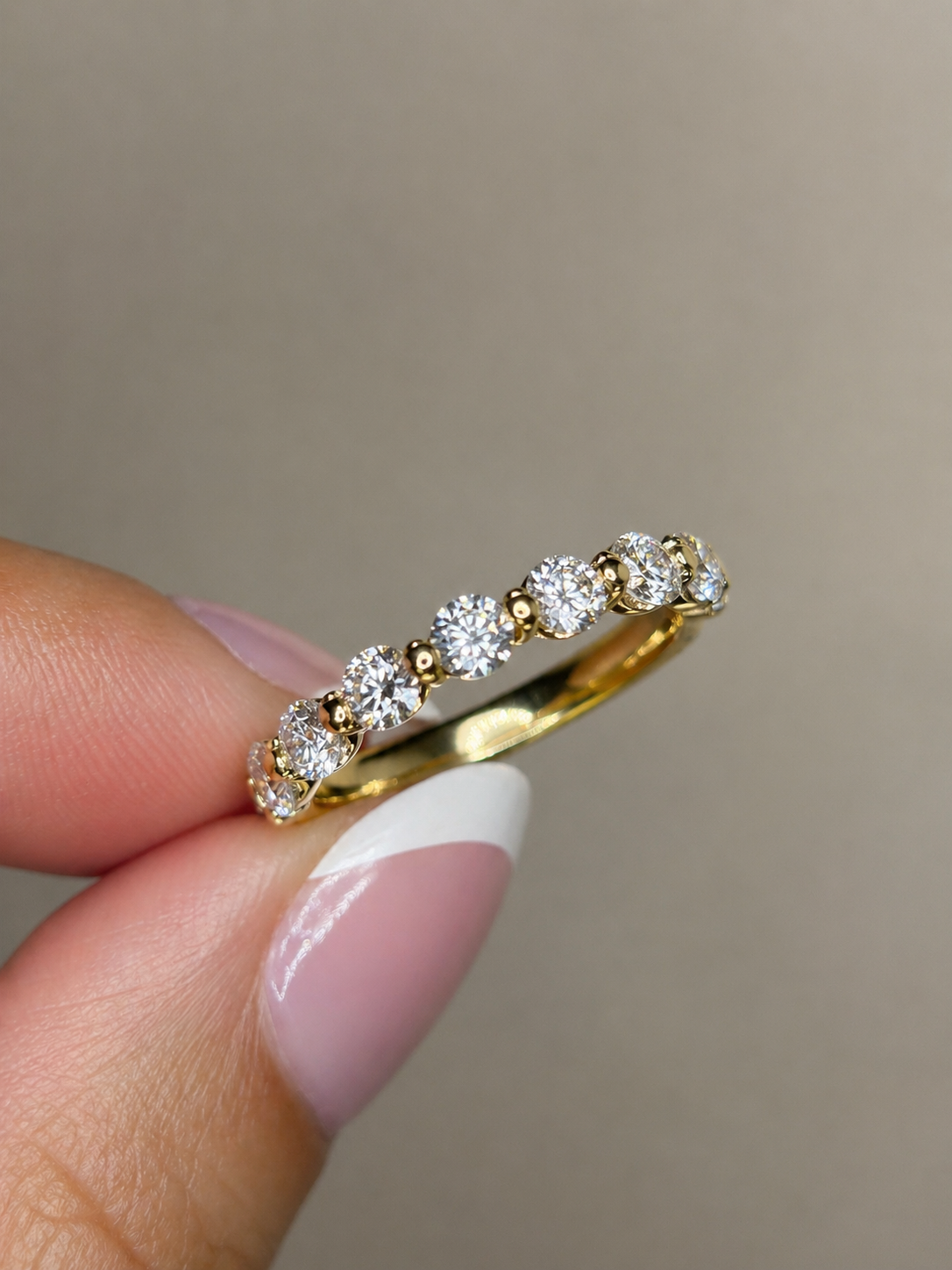 1.46 Carat Round Diamond Shared Prong Set Band